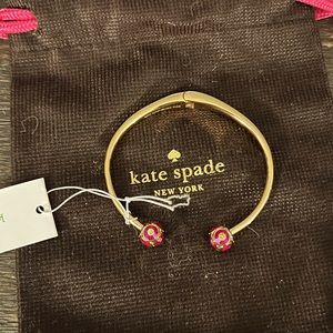 Kate Spade hinged cuff bracelet. NWT Stones are a beautiful hot pink.